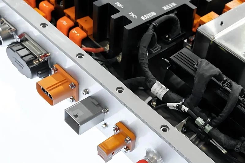 EV battery pack showing high-voltage terminals and sealing interfaces